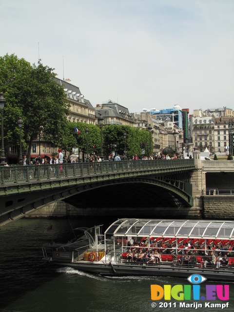 SX18577 Canal boat passing bridge over water and Centre Georges Pompidou, Paris, France